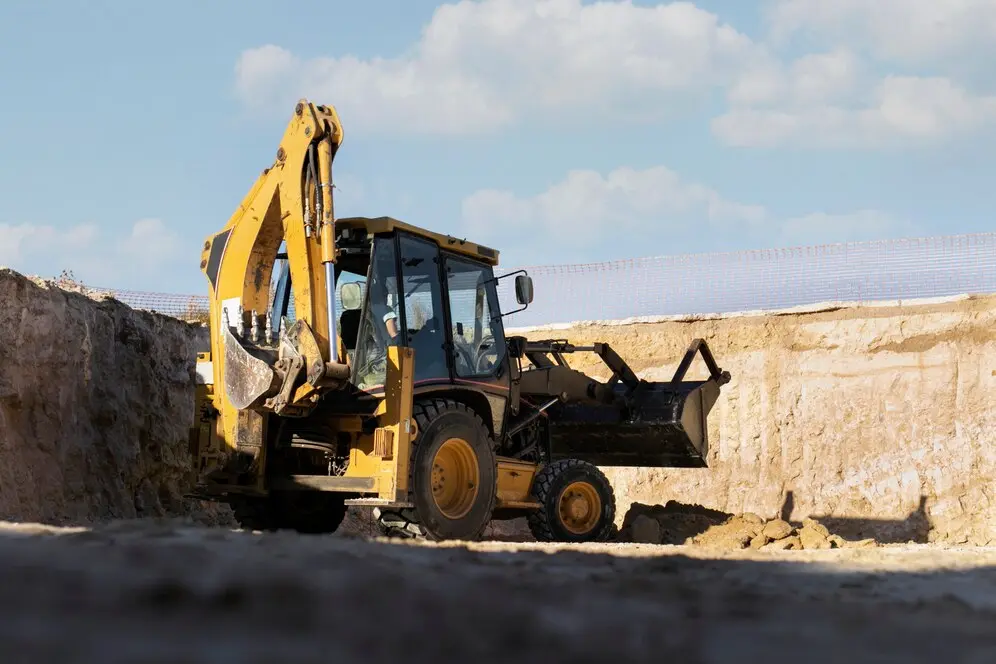 excavator-digging-ground-day-light_23-2149194767